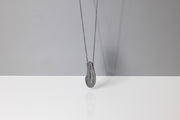 Todd Reed necklace in Sterling silver with patina, silver brilliant cut diamonds (~.54ct), and 18k yellow gold clasp